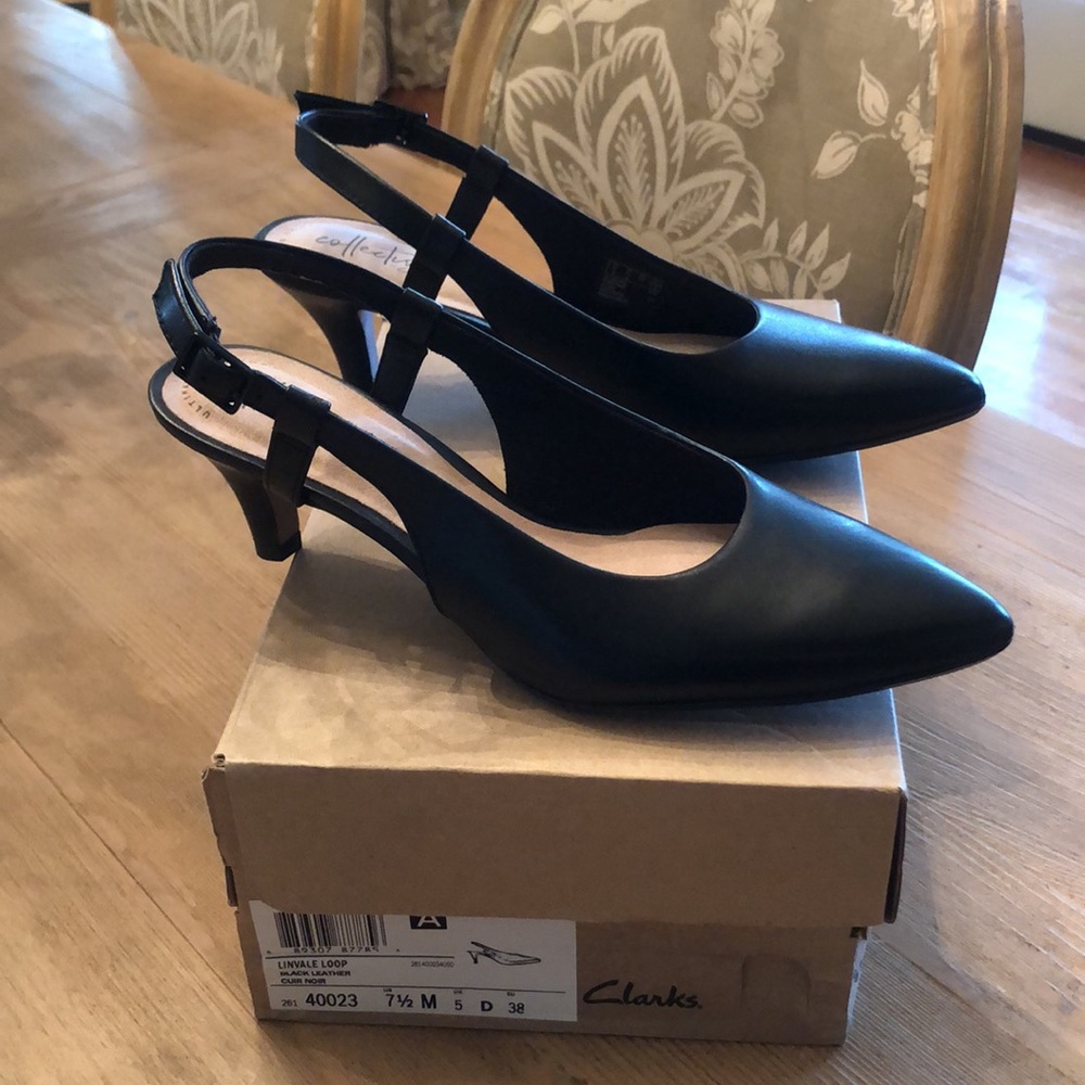 Clarks pumps NWT in box. Black leather